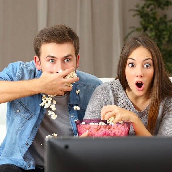 Family enjoying television